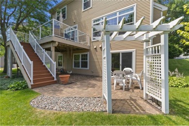 Stunning 5-bed, 4-bath home with a 3-car garage in Blaine's on TPC of the Twin Cities in Minnesota - for sale on GolfHomes.com, golf home, golf lot