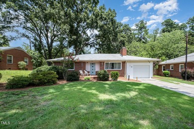 Super cute 1950s ranch with mid-mod flair in desirable on Hillandale Golf Course in North Carolina - for sale on GolfHomes.com, golf home, golf lot