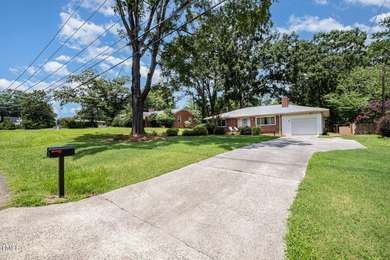 Super cute 1950s ranch with mid-mod flair in desirable on Hillandale Golf Course in North Carolina - for sale on GolfHomes.com, golf home, golf lot