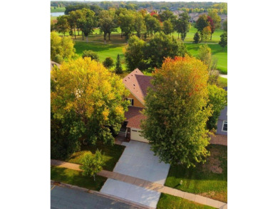 Stunning 5-bed, 4-bath home with a 3-car garage in Blaine's on TPC of the Twin Cities in Minnesota - for sale on GolfHomes.com, golf home, golf lot