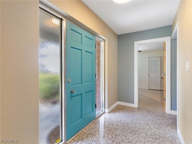 True mid-century architecture updated with thought and on Fort Myers Country Club in Florida - for sale on GolfHomes.com, golf home, golf lot