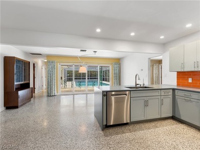 True mid-century architecture updated with thought and on Fort Myers Country Club in Florida - for sale on GolfHomes.com, golf home, golf lot