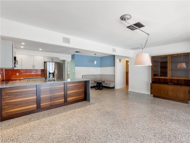 True mid-century architecture updated with thought and on Fort Myers Country Club in Florida - for sale on GolfHomes.com, golf home, golf lot