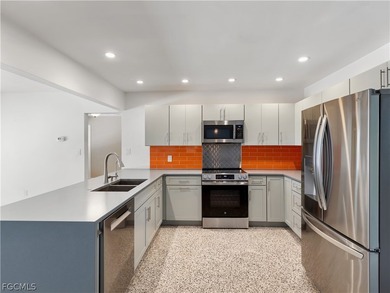 True mid-century architecture updated with thought and on Fort Myers Country Club in Florida - for sale on GolfHomes.com, golf home, golf lot