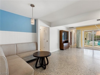 True mid-century architecture updated with thought and on Fort Myers Country Club in Florida - for sale on GolfHomes.com, golf home, golf lot