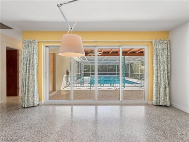 True mid-century architecture updated with thought and on Fort Myers Country Club in Florida - for sale on GolfHomes.com, golf home, golf lot