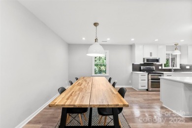 Welcome home to this beautifully updated gem in the heart of the on Raintree Country Club in North Carolina - for sale on GolfHomes.com, golf home, golf lot