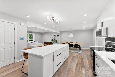 Welcome home to this beautifully updated gem in the heart of the on Raintree Country Club in North Carolina - for sale on GolfHomes.com, golf home, golf lot