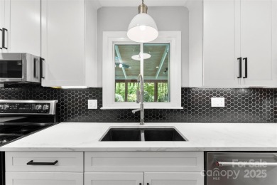 Welcome home to this beautifully updated gem in the heart of the on Raintree Country Club in North Carolina - for sale on GolfHomes.com, golf home, golf lot