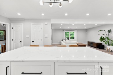 Welcome home to this beautifully updated gem in the heart of the on Raintree Country Club in North Carolina - for sale on GolfHomes.com, golf home, golf lot
