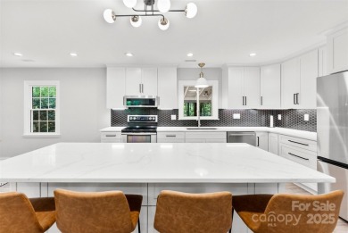 Welcome home to this beautifully updated gem in the heart of the on Raintree Country Club in North Carolina - for sale on GolfHomes.com, golf home, golf lot
