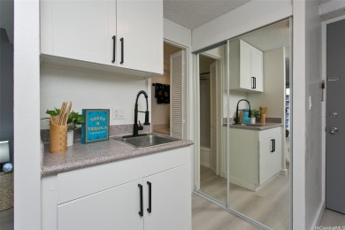 Own a piece of paradise in this newly remodeled Island Colony on Ala Wai Golf Course in Hawaii - for sale on GolfHomes.com, golf home, golf lot