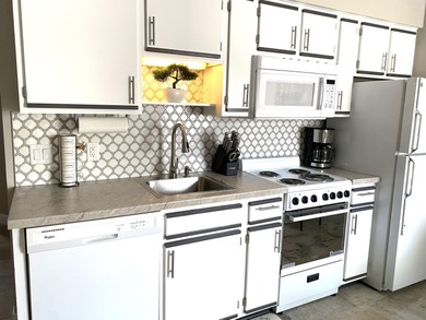 Discover this fully remodeled and furnished walk-in 1 bed/1 bath on Pointe Royale Village Country Club in Missouri - for sale on GolfHomes.com, golf home, golf lot