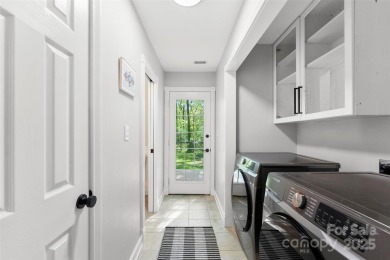 Welcome home to this beautifully updated gem in the heart of the on Raintree Country Club in North Carolina - for sale on GolfHomes.com, golf home, golf lot