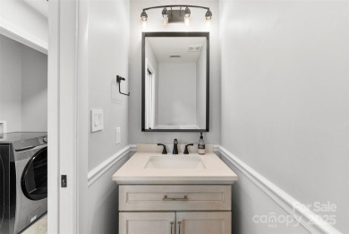 Welcome home to this beautifully updated gem in the heart of the on Raintree Country Club in North Carolina - for sale on GolfHomes.com, golf home, golf lot