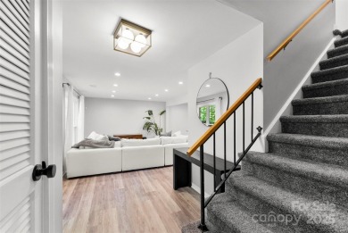 Welcome home to this beautifully updated gem in the heart of the on Raintree Country Club in North Carolina - for sale on GolfHomes.com, golf home, golf lot