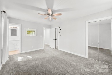 Welcome home to this beautifully updated gem in the heart of the on Raintree Country Club in North Carolina - for sale on GolfHomes.com, golf home, golf lot