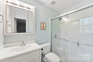 Welcome home to this beautifully updated gem in the heart of the on Raintree Country Club in North Carolina - for sale on GolfHomes.com, golf home, golf lot