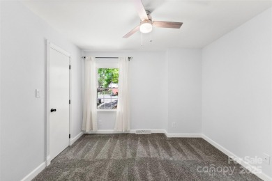 Welcome home to this beautifully updated gem in the heart of the on Raintree Country Club in North Carolina - for sale on GolfHomes.com, golf home, golf lot