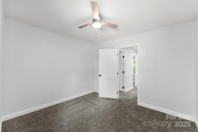Welcome home to this beautifully updated gem in the heart of the on Raintree Country Club in North Carolina - for sale on GolfHomes.com, golf home, golf lot
