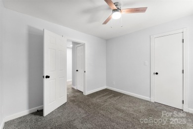 Welcome home to this beautifully updated gem in the heart of the on Raintree Country Club in North Carolina - for sale on GolfHomes.com, golf home, golf lot