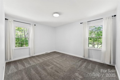 Welcome home to this beautifully updated gem in the heart of the on Raintree Country Club in North Carolina - for sale on GolfHomes.com, golf home, golf lot