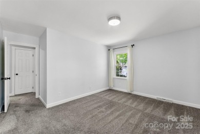 Welcome home to this beautifully updated gem in the heart of the on Raintree Country Club in North Carolina - for sale on GolfHomes.com, golf home, golf lot