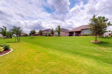 Exceptional Brick Weston Model with Golf Cart Garage.

Step into on Wildhorse Golf Club of Robson Ranch in Texas - for sale on GolfHomes.com, golf home, golf lot