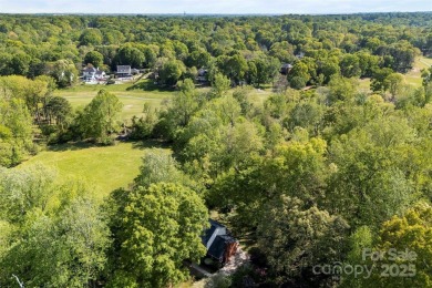 Welcome home to this beautifully updated gem in the heart of the on Raintree Country Club in North Carolina - for sale on GolfHomes.com, golf home, golf lot