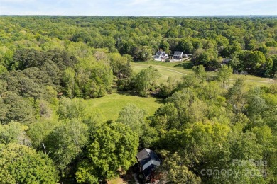 Welcome home to this beautifully updated gem in the heart of the on Raintree Country Club in North Carolina - for sale on GolfHomes.com, golf home, golf lot