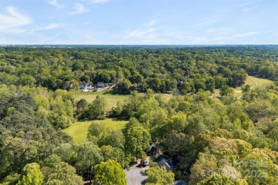 Welcome home to this beautifully updated gem in the heart of the on Raintree Country Club in North Carolina - for sale on GolfHomes.com, golf home, golf lot