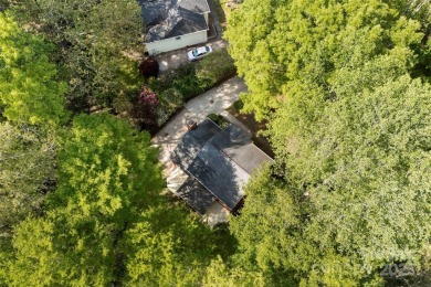 Welcome home to this beautifully updated gem in the heart of the on Raintree Country Club in North Carolina - for sale on GolfHomes.com, golf home, golf lot
