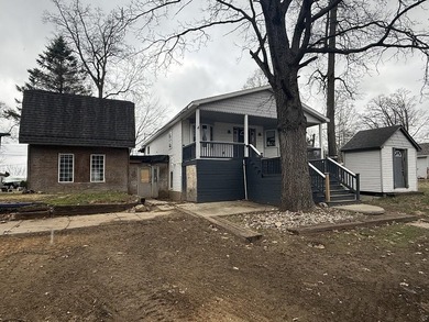 Investor or project-ready opportunity! This ranch with walkout on Hankerd Hills Golf Course in Michigan - for sale on GolfHomes.com, golf home, golf lot