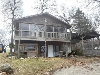Investor or project-ready opportunity! This ranch with walkout on Hankerd Hills Golf Course in Michigan - for sale on GolfHomes.com, golf home, golf lot