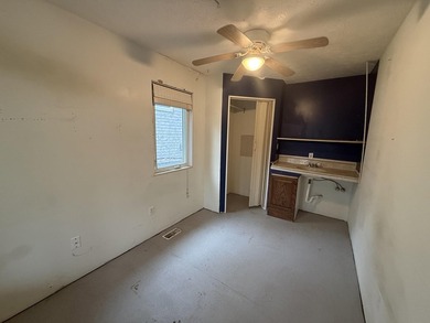 Investor or project-ready opportunity! This ranch with walkout on Hankerd Hills Golf Course in Michigan - for sale on GolfHomes.com, golf home, golf lot