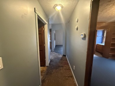 Investor or project-ready opportunity! This ranch with walkout on Hankerd Hills Golf Course in Michigan - for sale on GolfHomes.com, golf home, golf lot