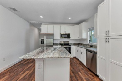 Brand new duplexes MOVE IN READY! Each Unit contains 2 bedrooms on Twin Isles Country Club in Florida - for sale on GolfHomes.com, golf home, golf lot