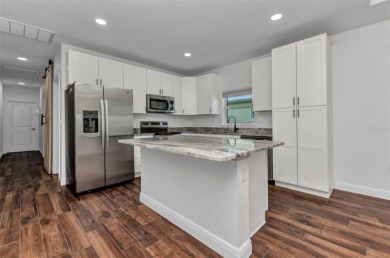 Brand new duplexes MOVE IN READY! Each Unit contains 2 bedrooms on Twin Isles Country Club in Florida - for sale on GolfHomes.com, golf home, golf lot