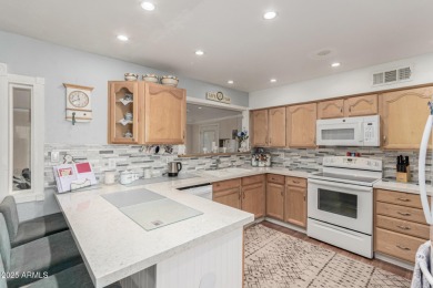 Beautifully maintained home on one of the larger cul-de-sac lots on Fountain of the Sun Country Club in Arizona - for sale on GolfHomes.com, golf home, golf lot