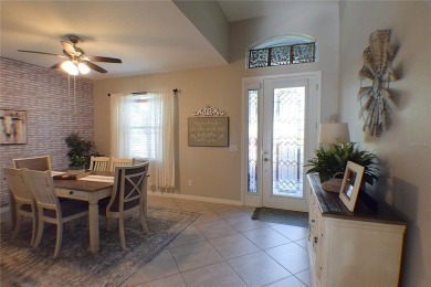 Move-in Ready 3 Bedroom, 2 Bath Home with Serene Pond Views! on Tampa Bay Golf and Country Club in Florida - for sale on GolfHomes.com, golf home, golf lot