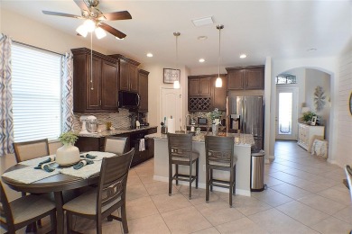 Move-in Ready 3 Bedroom, 2 Bath Home with Serene Pond Views! on Tampa Bay Golf and Country Club in Florida - for sale on GolfHomes.com, golf home, golf lot
