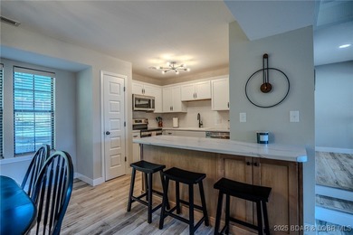 This 3 bedroom, 2 bath condo is sleek, modern & truly move-in on Seasons Ridge At Four Seasons in Missouri - for sale on GolfHomes.com, golf home, golf lot