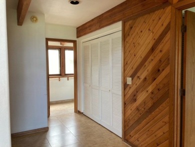Discovery Harbour - Polynesian Longhouse Lindal Cedar home that on Discovery Harbour Golf Course in Hawaii - for sale on GolfHomes.com, golf home, golf lot