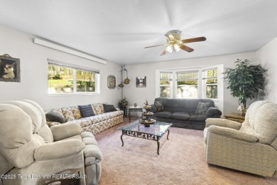Discover mountain living at its finest with this stunning home on Star Valley RV Golf Course in Wyoming - for sale on GolfHomes.com, golf home, golf lot