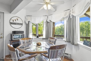 Discover mountain living at its finest with this stunning home on Star Valley RV Golf Course in Wyoming - for sale on GolfHomes.com, golf home, golf lot