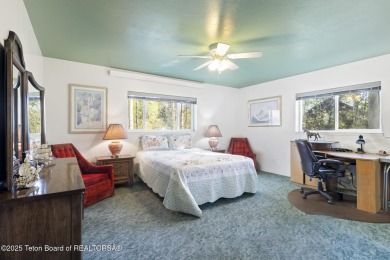 Discover mountain living at its finest with this stunning home on Star Valley RV Golf Course in Wyoming - for sale on GolfHomes.com, golf home, golf lot