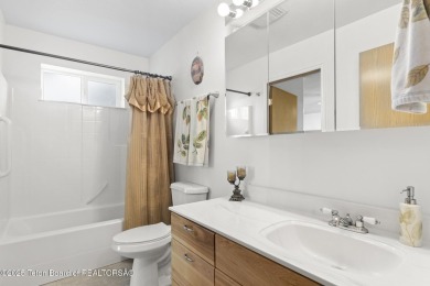 Discover mountain living at its finest with this stunning home on Star Valley RV Golf Course in Wyoming - for sale on GolfHomes.com, golf home, golf lot