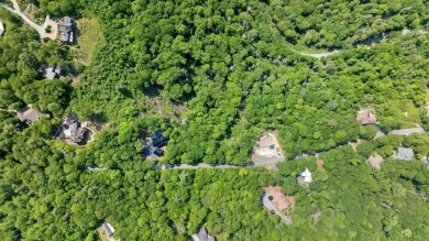 Just a few minutes from Main Street Highlands, you'll find this on Highlands Falls Country Club in North Carolina - for sale on GolfHomes.com, golf home, golf lot