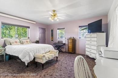 Discover mountain living at its finest with this stunning home on Star Valley RV Golf Course in Wyoming - for sale on GolfHomes.com, golf home, golf lot