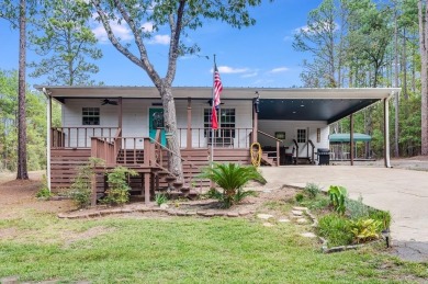 Nestled amidst the serene East Texas piney woods, this on Rayburn Country Club in Texas - for sale on GolfHomes.com, golf home, golf lot